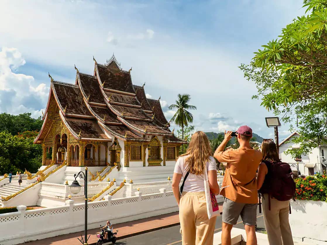 Golden stupas along the tranquil Mekong River