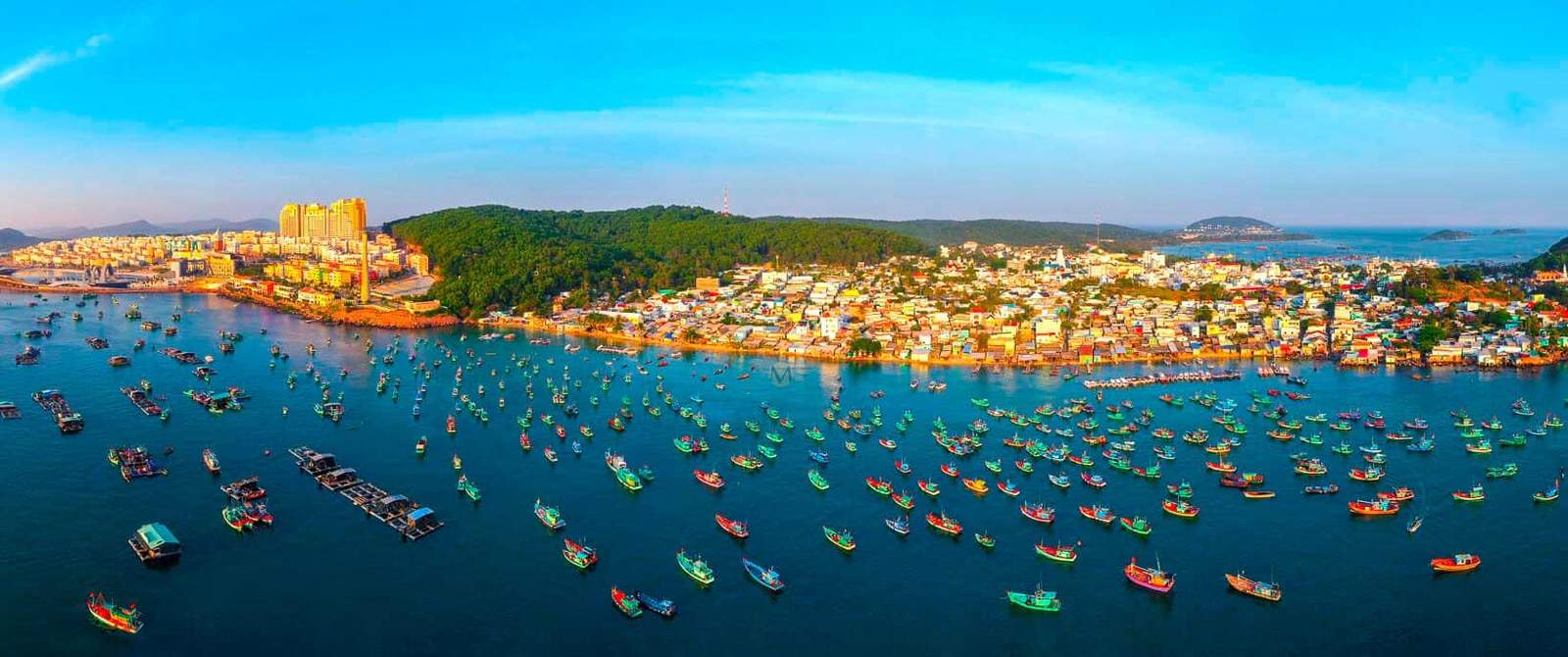 Scenic aerial view of Vietnam’s turquoise coastline and fishing boats