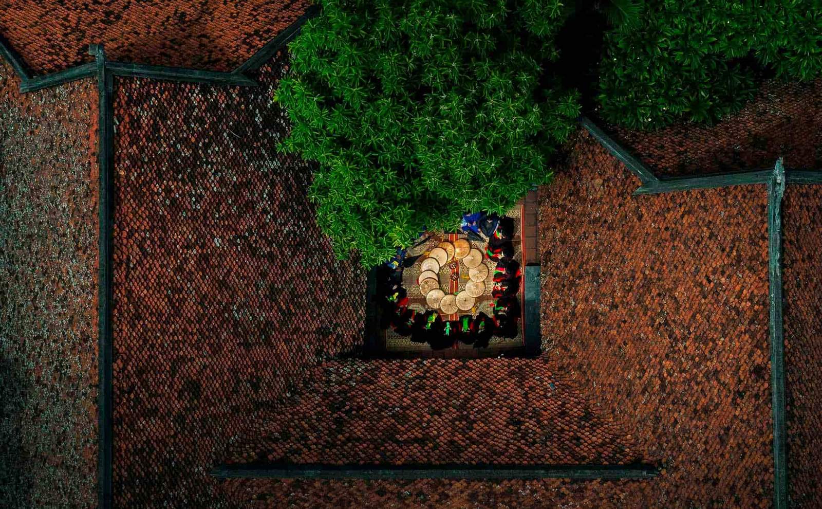 Aerial view of the Temple of Literature in Hanoi Vietnam with traditional tiled roofs and historic architecture