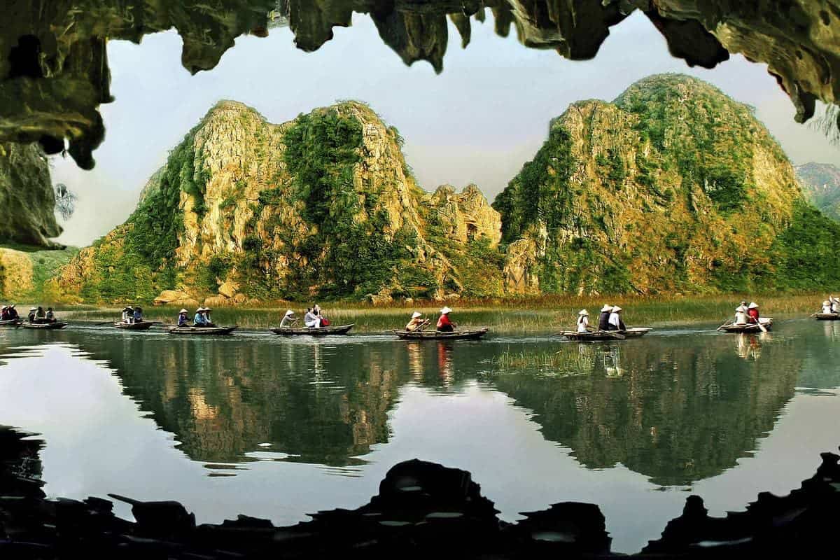 Trang An Ninh Binh with limestone karst mountains and scenic river landscape in Vietnam
