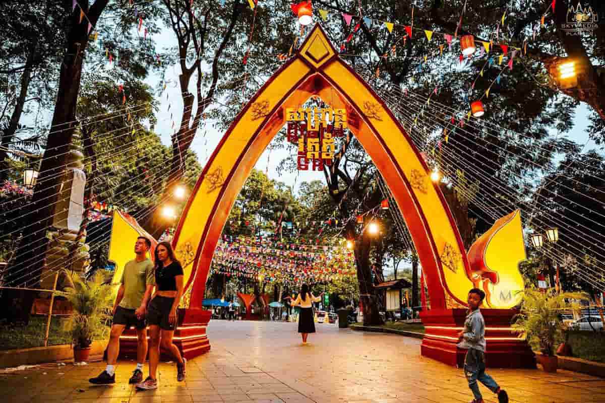Vibrant festival entrance with colorful lanterns and traditional decorations.