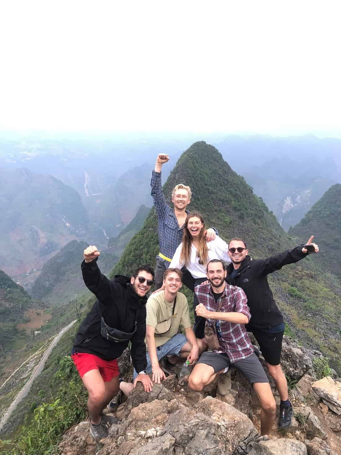 Adventure group on Machu Picchu mountain, Peru.