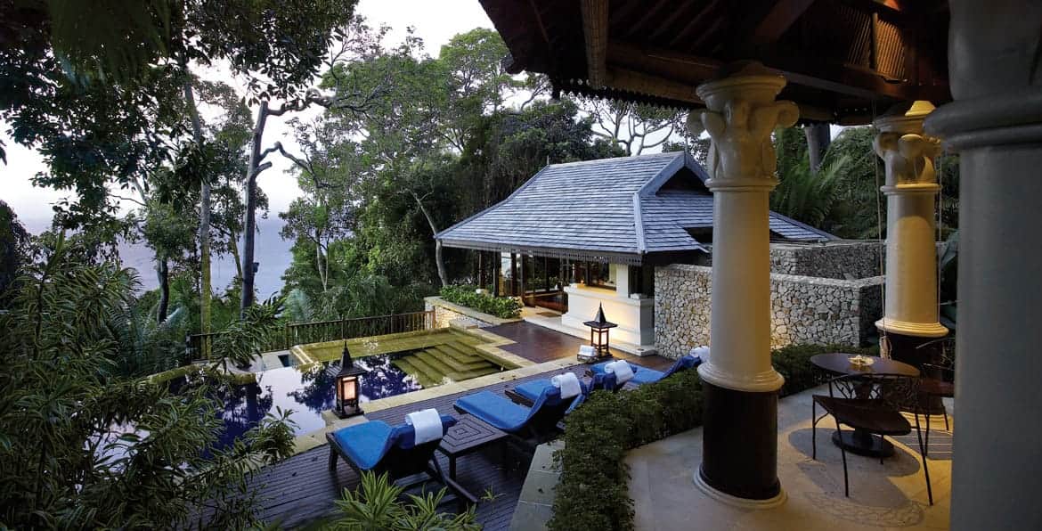 Luxury villa with private pool and lush tropical garden setting.