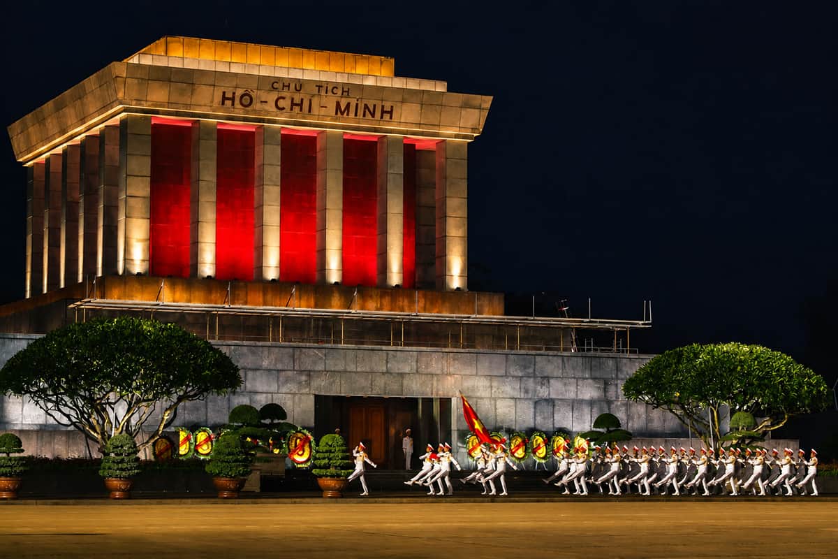 Ho Chi Minh Mausoleum illuminated at night in Ba Dinh Square Hanoi Vietnam