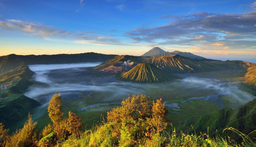 Experience the sun rising over Mt Bromo and climb to its crater